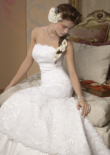 My advice is to go for the classic lace wedding gown